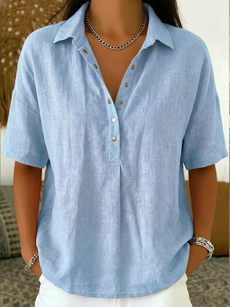 Van Delft Mode® | Blusa con cuello y detalle de botones.