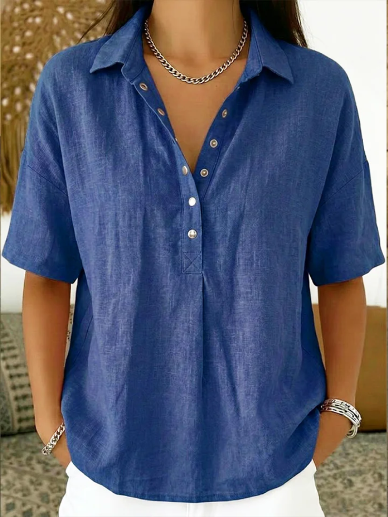 Van Delft Mode® | Blusa con cuello y detalle de botones.