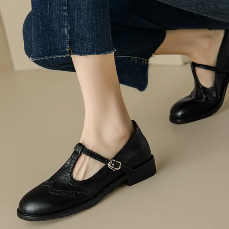 Elegantes Mary Janes con T-Strap
