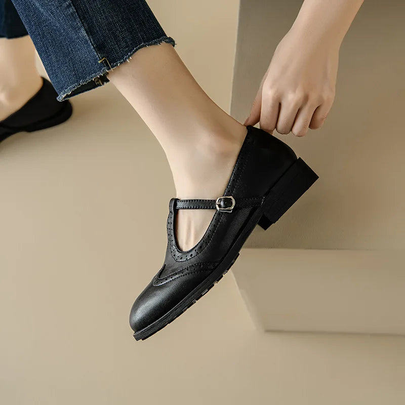 Elegantes Mary Janes con T-Strap